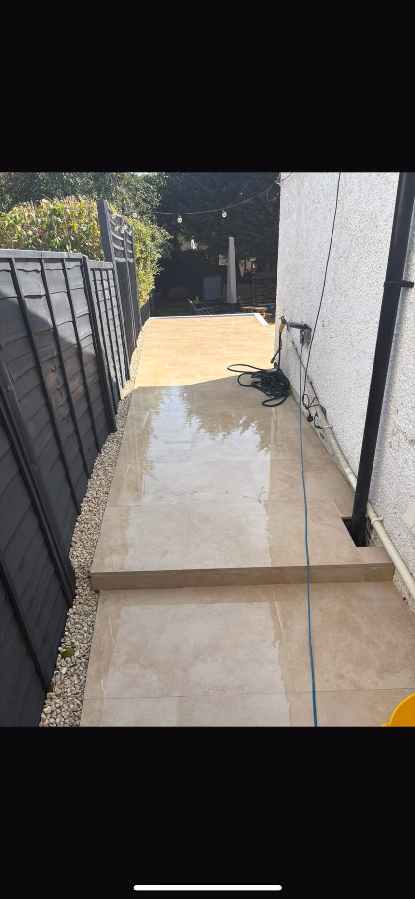 Raised porcelain patio with broad steps (3)
