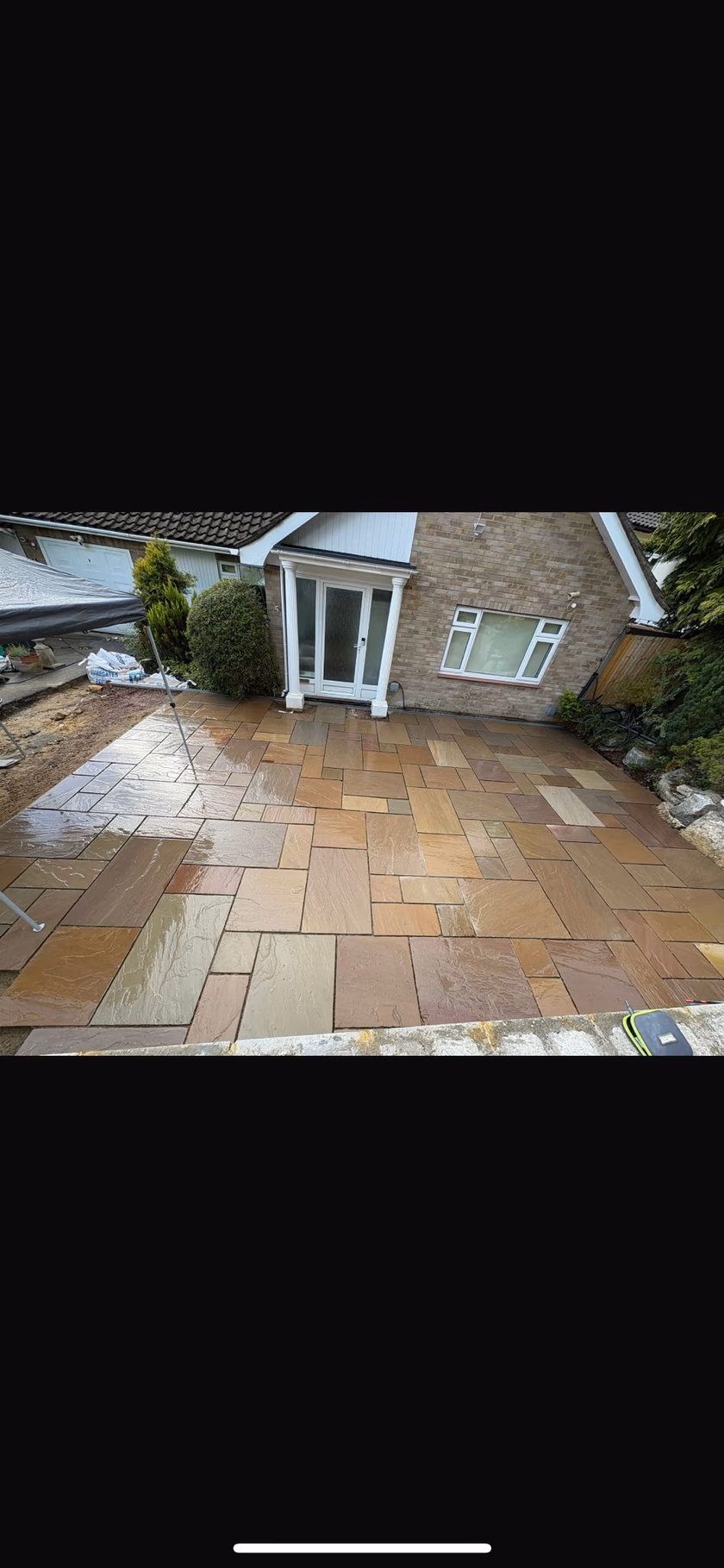 Lawn-led garden with boulder feature (3)